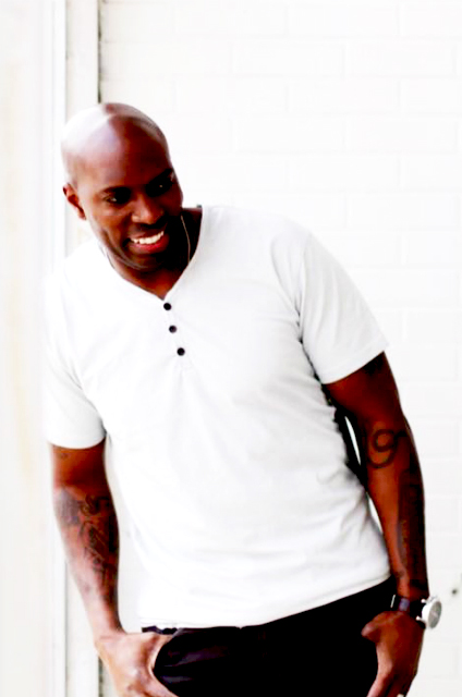 Kwabena aka KB - barber at Oasis Barbershop