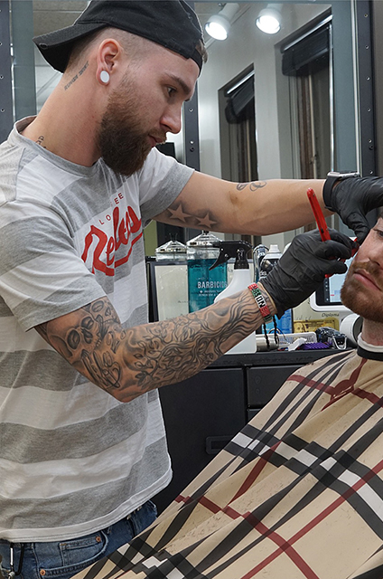 Tom Schroedl - barber at Oasis Barbershop
